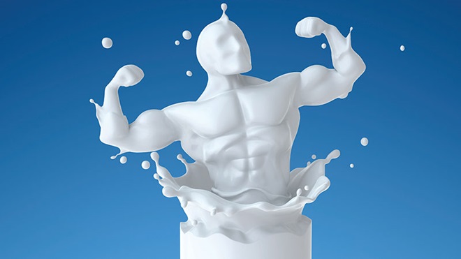 Corpo forte e saudável sai de um copo de leite