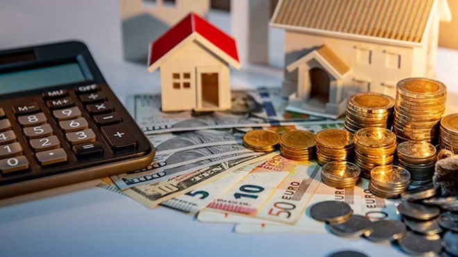 Máquina de calcular, casas e dinheiro