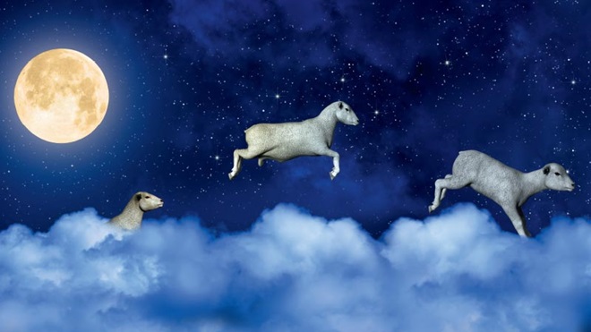 Ilustração com três carneiros a saltarem sobre nuvens azuis claras, com um céu azul escuro, algumas estrelas e uma lua cheia