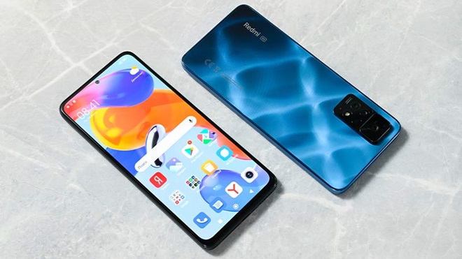 dois telemóveis xiaomi redmi sobre uma superfície cinzenta